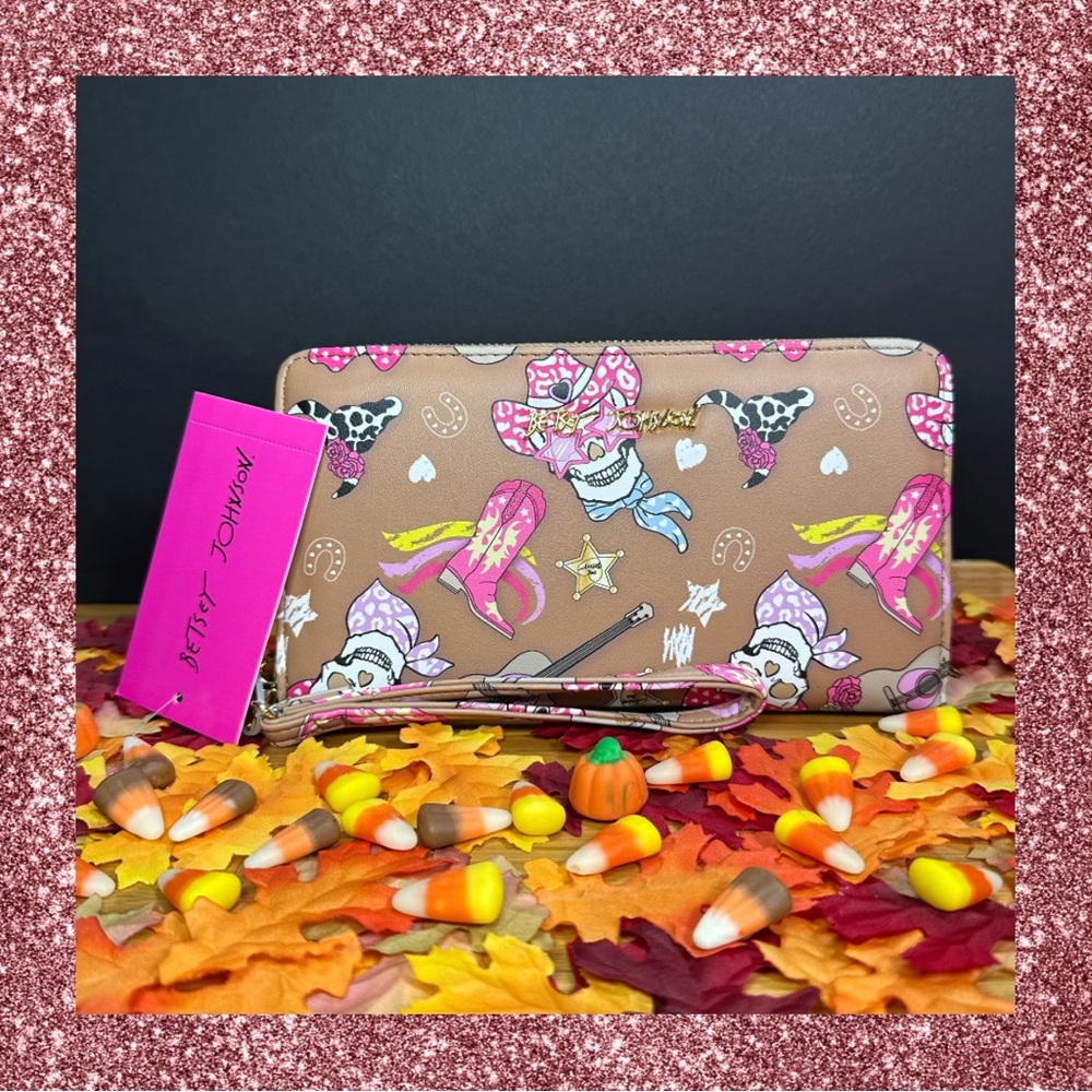 Betsey Johnson Tan Wristlet with Haunted Cowgirl design